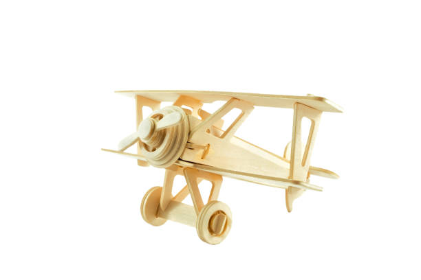 istock Wood airplane isolated on white background., This has clipping path 675823542