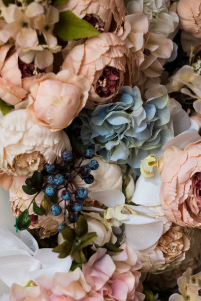 istock Soft pink blue background of flowers 675825306