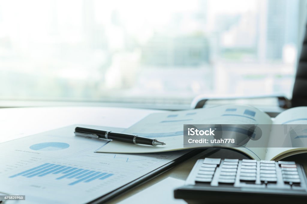 business financial accounting Data Analysis. Pen with business report on financial advisor desk. Concept of business planning , accounting, business analysis,financial planning services. Accountancy Stock Photo