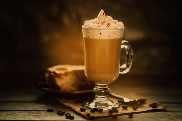 Photography of a glass of cup coffee with cream