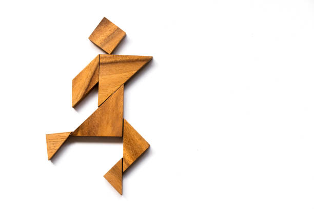 Wooden tangram as happy man shape on white background (Concept as business has success)