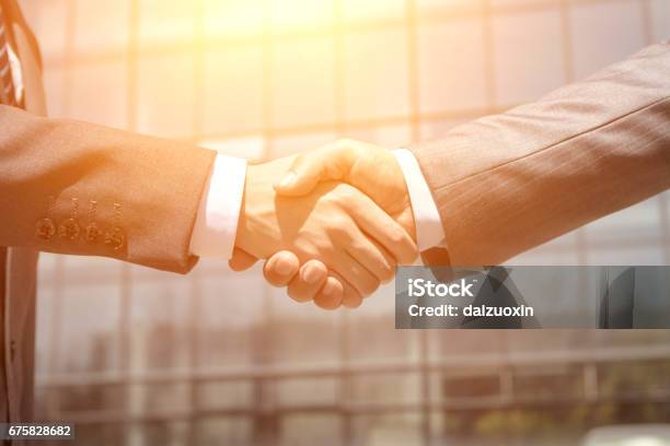 Business People Handshaking Stock Photo - Download Image Now - Agreement, Closing, Dealing Cards