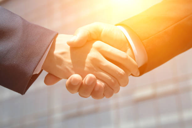 istock business people handshaking 675832736