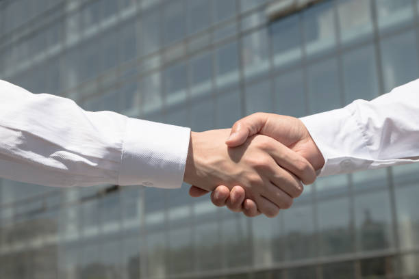 istock business people handshaking 675864702
