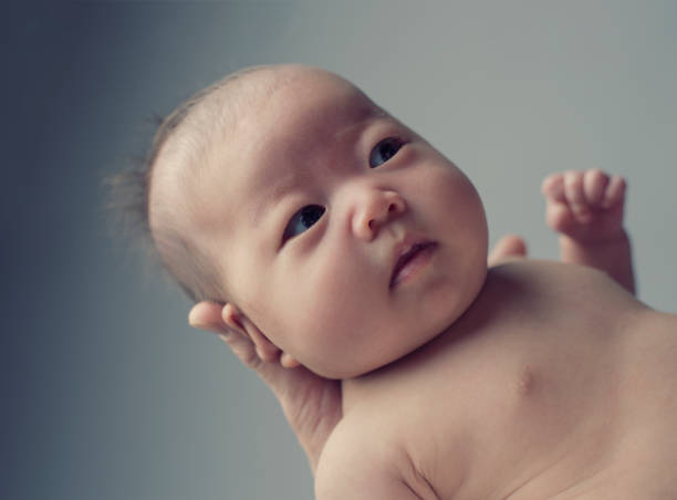 istock Baby girl with father in studio shot 675896514