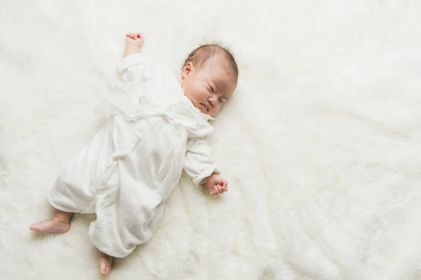 Sleeping newborn baby Baby girl is two months old. sleep issues in babies stock pictures, royalty-free photos & images