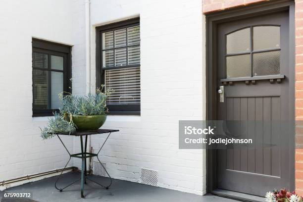 Entry Porch And Front Door Of An Art Deco Style Apartment Stock Photo - Download Image Now