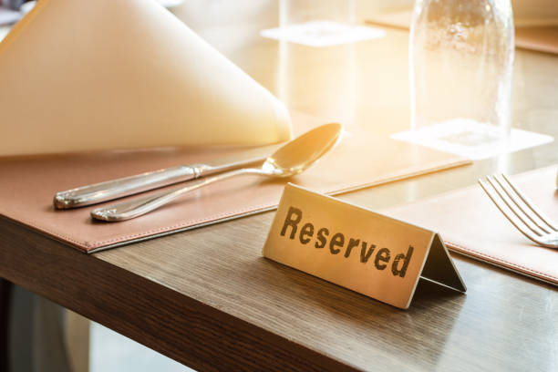 Restaurant reserved table sign Restaurant reserved table sign wildlife reserve stock pictures, royalty-free photos & images