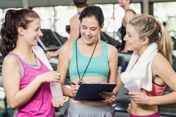 istock Athletic smiling women discussing about performance 675913572