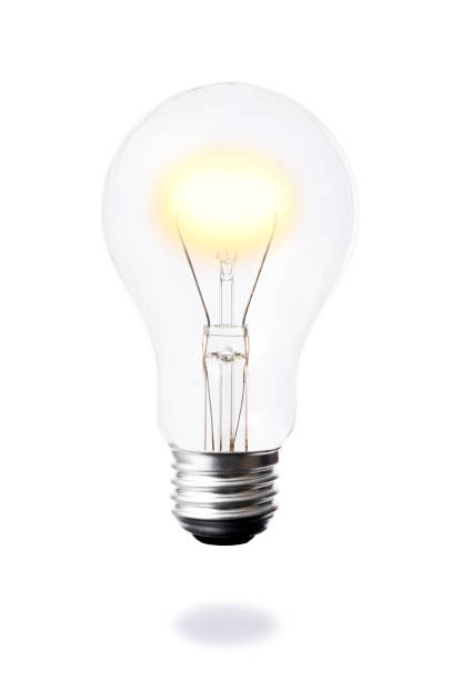 istock Isolated shot of floating a glowing light bulb on white background 675913804