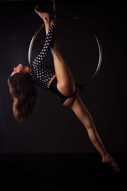istock Woman exercising on lyra 675930068
