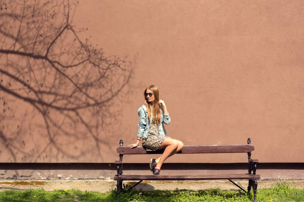 istock Young woman relaxing in the sunshine 675930864
