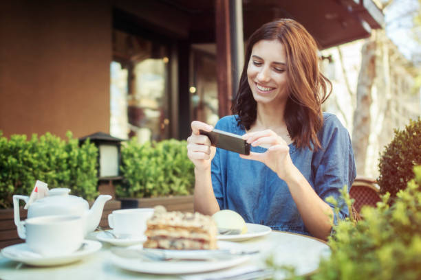 istock Girl taking pictures 675934502