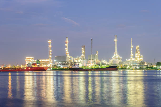 istock oil refinery industry light up,twilight time 675937376