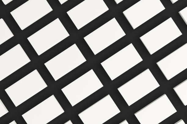 istock White blank business cards mock-up on black background 675937918