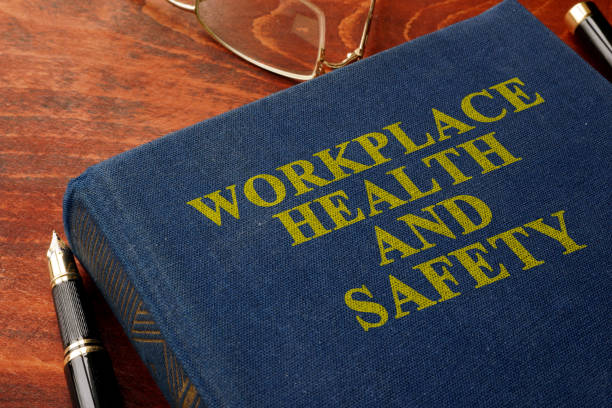 istock Title Workplace health and safety WHS on the book. 675938530