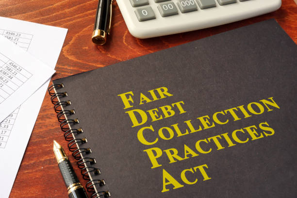 FDCPA Fair Debt Collection Practices Act on a table. FDCPA Fair Debt Collection Practices Act on a table. collection stock pictures, royalty-free photos & images