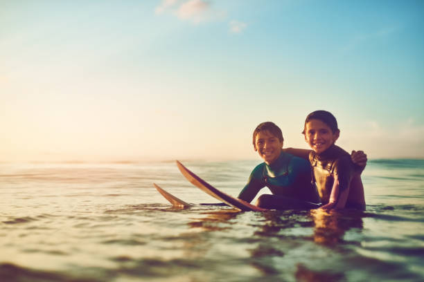 istock Life is fun when you're out surfing with a buddy 675941402