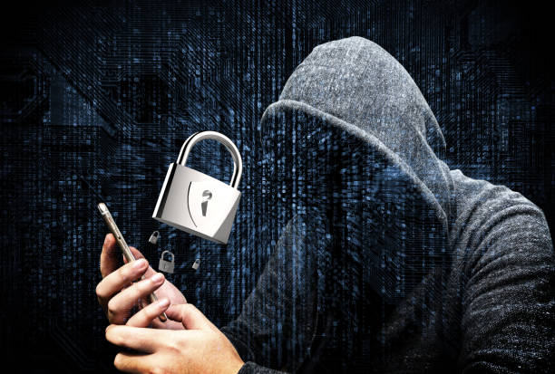 istock Double Exposure of hooded cyber crime hacker using mobile phone internet hacking in to cyberspace,online personal data security concept.Matrix code and 3d rendering master key popup out of smartphone. 675942222