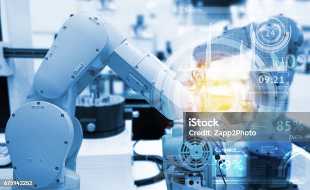 Industrial Internet Of Things And Industry 40 Concept Abstract Blue Background Of Technology Graphic And Automation Wireless Control Robotic Machine In Smart Factory With Flare Light Effect Stock Photo - Download Image Now