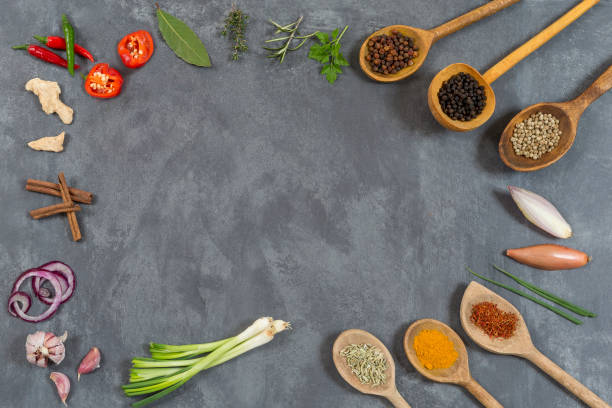istock slate board with vegetables, herbs and Spice collection 675947678