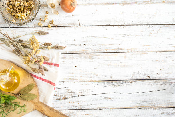 istock Spices and herbs on wooden background 675952340