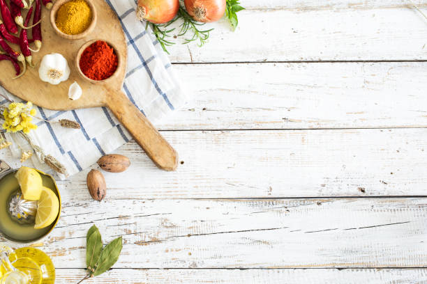 istock Spices and herbs on wooden background 675952582