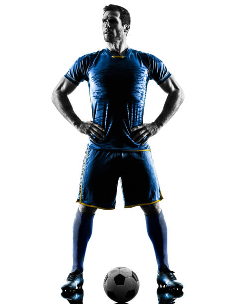 istock soccer player man standing silhouette isolated 675962236