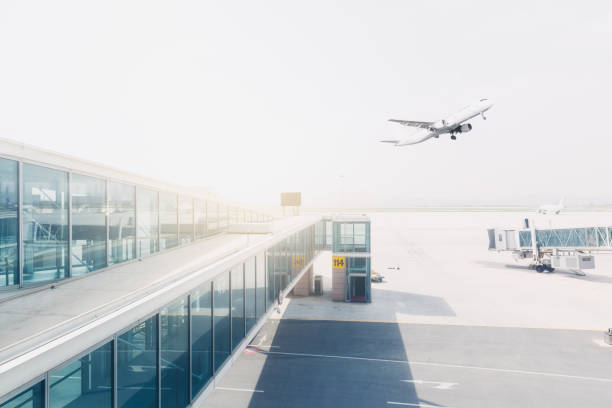 istock covered bridge of airport 675965162