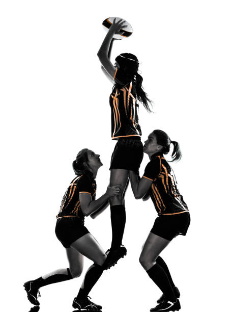 istock rugby women players team silhouette 675971920