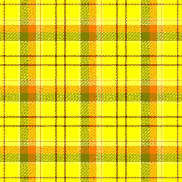 istock check diamond tartan plaid fabric seamless background - yellow color 675977918