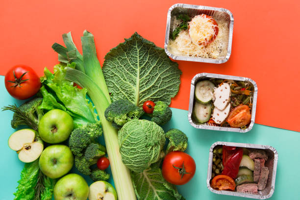 istock Flat lay of green vegetables on bright background 675979616