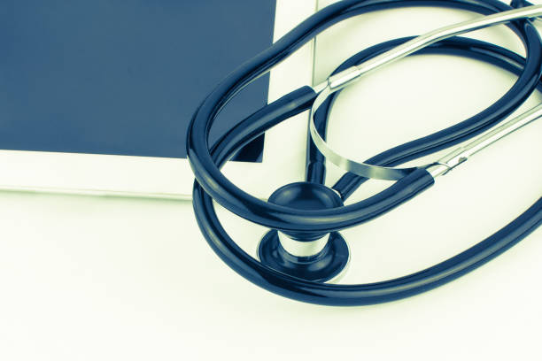 istock Tablet PC and stethoscope on a white background close 675979766