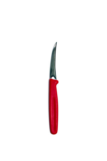 istock Fruit carving knife with red handle on isolated 675990488