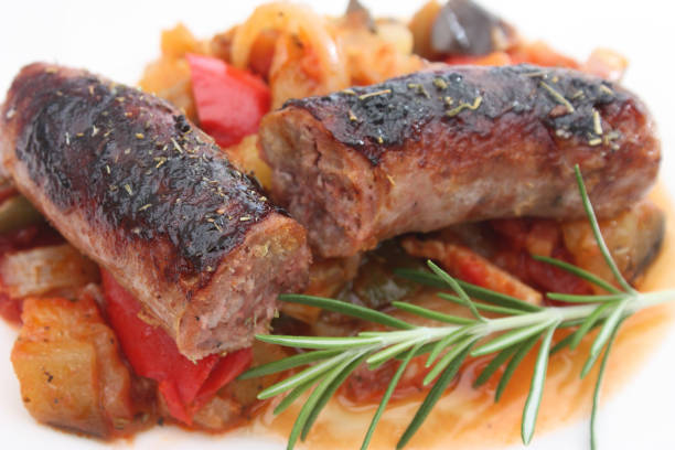 istock Grilled pork sausage on ratatouille bed 675991156