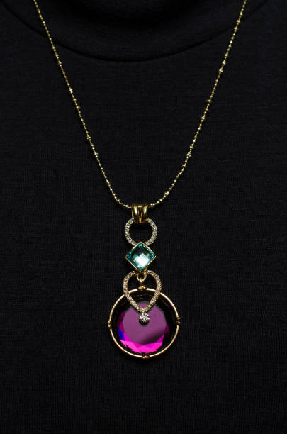 istock Pendant with sapphire on a black background 676001706