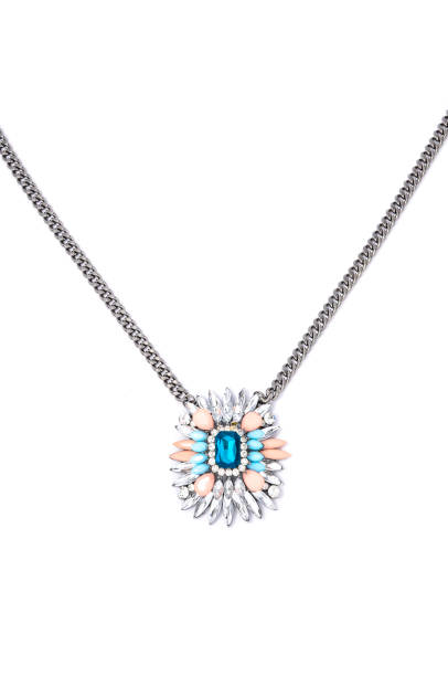 istock pendant with flower and blue gem  on a white background 676001934