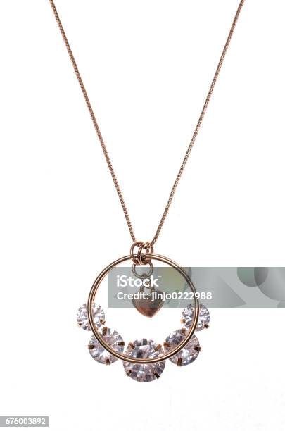 Round Pendant With A Heart On A White Background Stock Photo - Download Image Now - Amethyst, Arts Culture and Entertainment, Bead