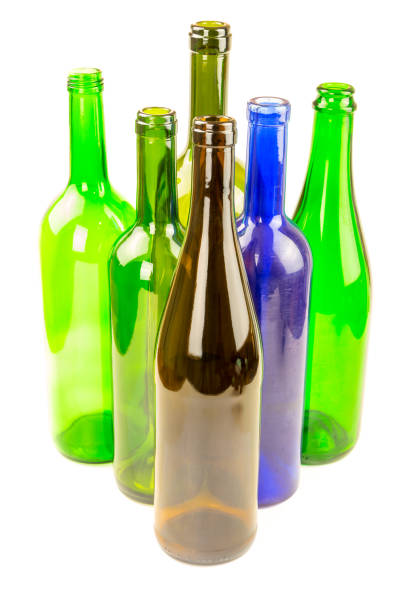 istock Still life of colorful empty bottles isolated on white background. 676011940