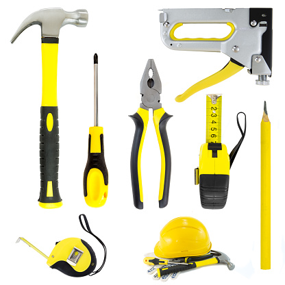Set of yellow and black tools cut out on a white background. Tools series.
