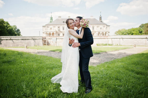 istock Wedding couple backround vintage castle at sunny day 676023340