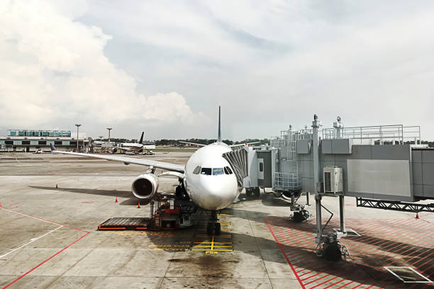 istock The Tunnel of the jet bridge connected to the aircraft. 676023708