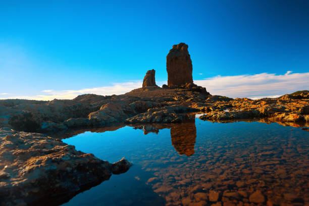 istock Roque Nublo view in the sunset time 676023880