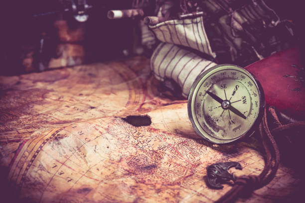istock Columbus day and world map with compass 676031950