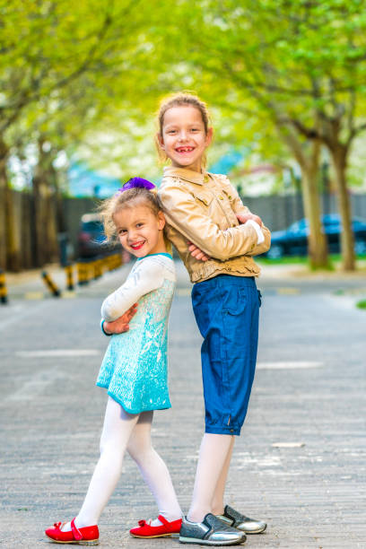 istock Children playing together outdoors 676037738