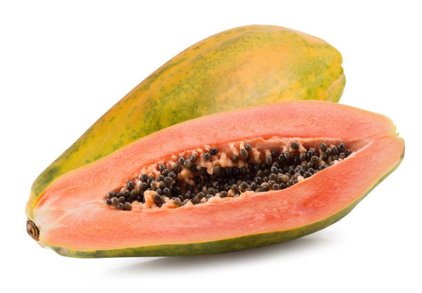 istock one whole and a half of papaya isolated 676045408