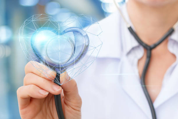istock The Cardiologist listens to the heart . 676079104