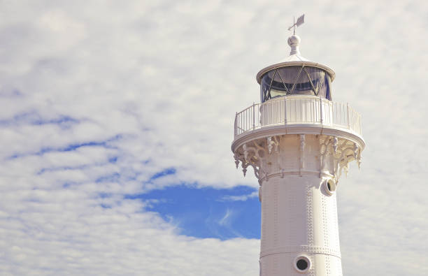 istock Close up of white lighthouse 676104240