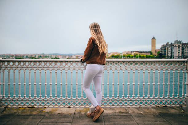 istock Young woman looking at the landscape 676109400