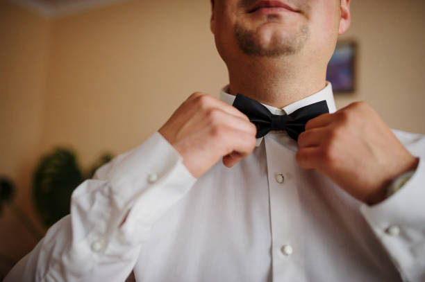 istock Man wear bow tie. Groom at wedding day. 676128338